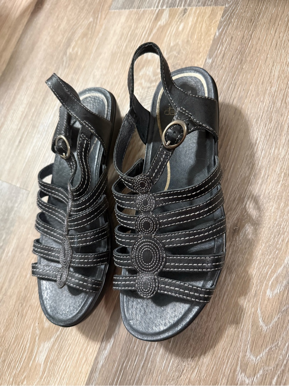 Dansko Black Multi-Strap Slingback Sandals with Decorative Medallions